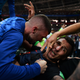 Illustration for article titled Photographer Tackled By Celebrating Croatian Players Got Incredible Photos, Kisses